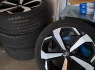 Grajewo ogłoszenia: Sprzedam super alufelgi z oponami letnimi do Nissana. - zdjęcie